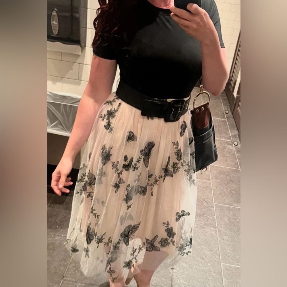 Black and Cream Floral Dress with Butterfly detailing.